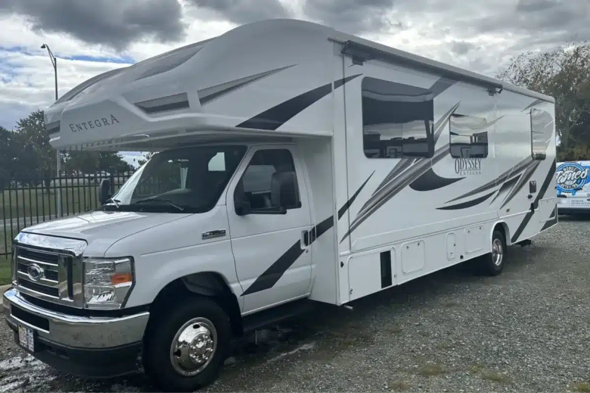 Large RV with a polished exterior after RV detailing.