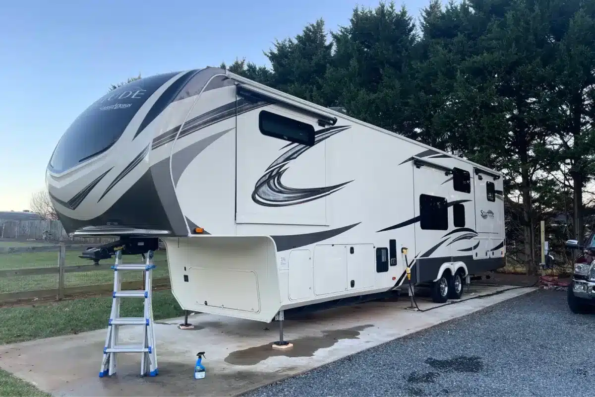 RV receiving professional detailing service for a clean finish.